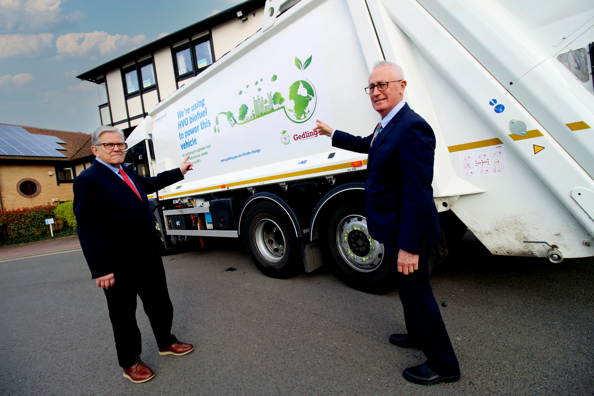 Leader and Councillor stood next to the new biofuel vehicle