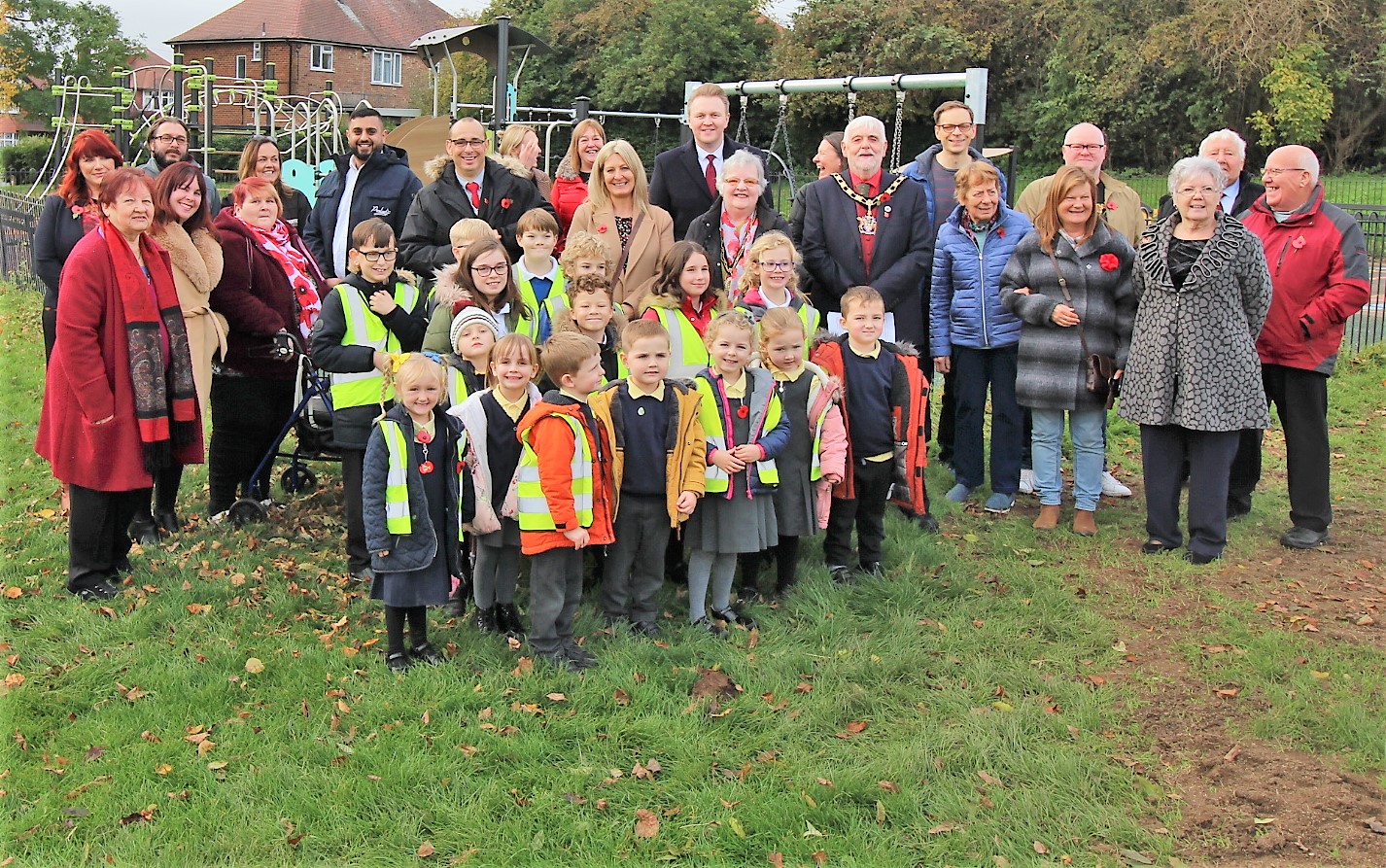 Group photo of attendees at the opening of Killisick Play Area